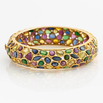 Bracelet, gold with multicolored gemstones.