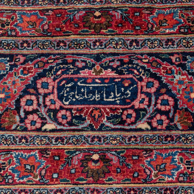 An antique Moud carpet of 'Ardabil' design, approximately 445.5 x 332 cm.