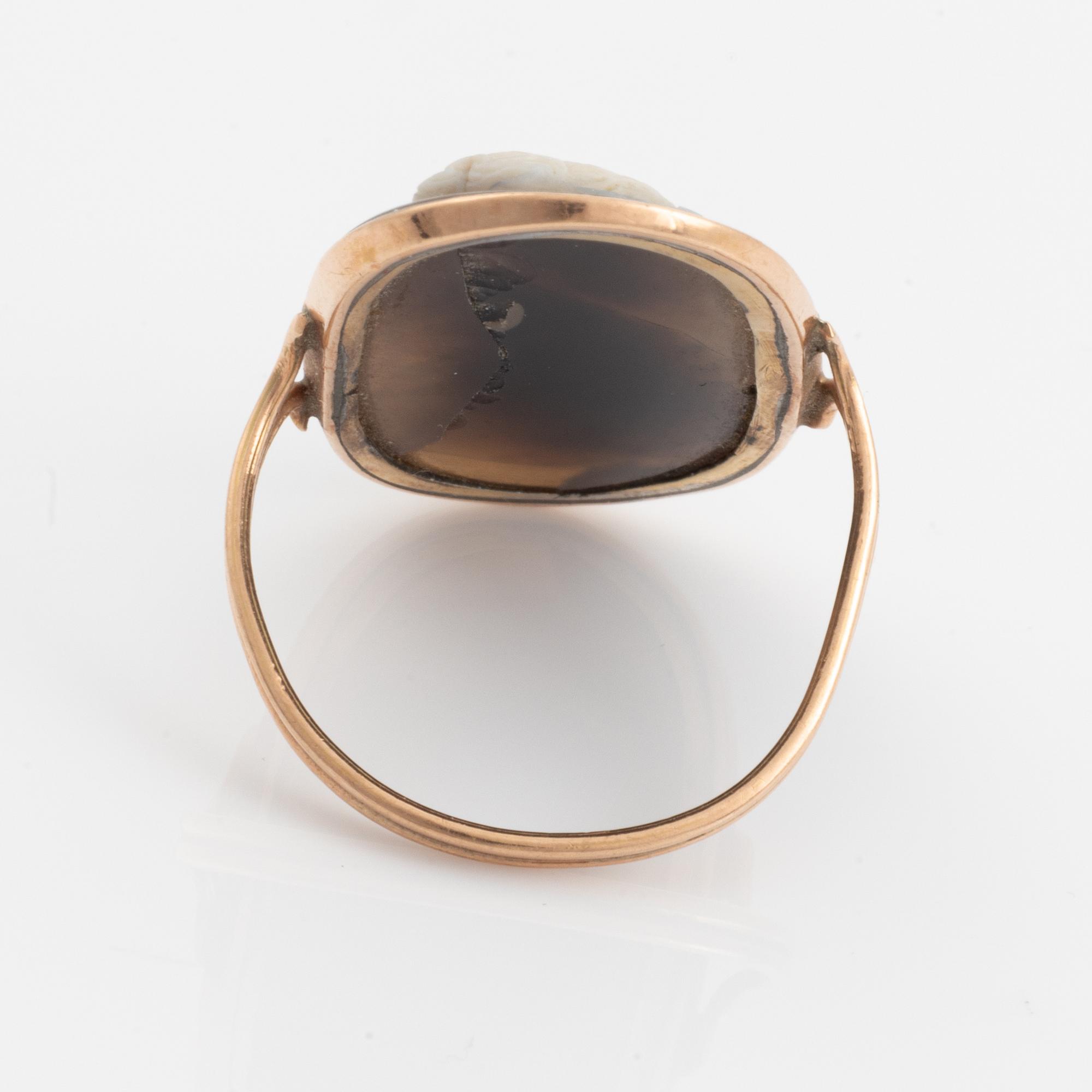 A gold and cameoring, signed Berini.