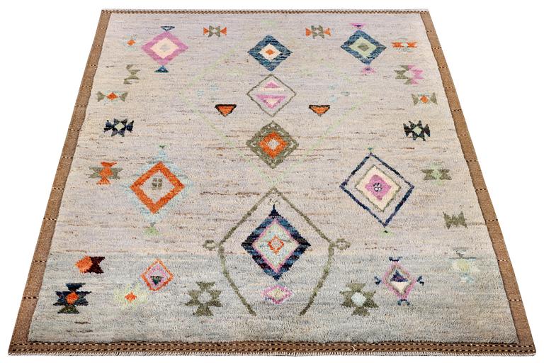 A Moroccan rug, c. 229 x 169 cm.