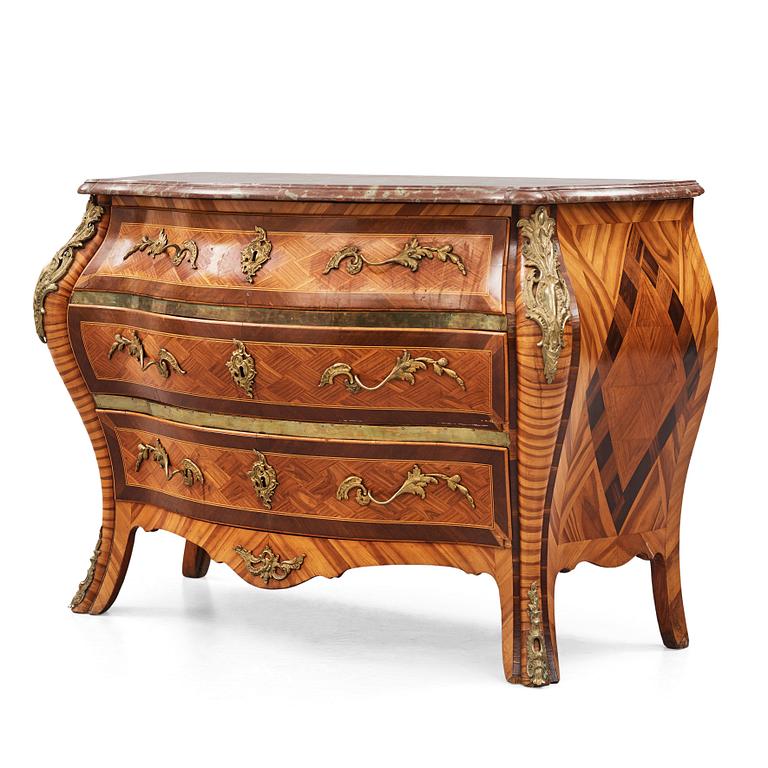 A Swedish Rococo commode, veneered with rosewood and amaranth.