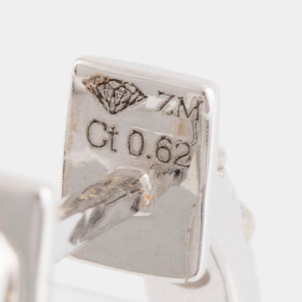 Brilliant cut diamond hoop earrings.