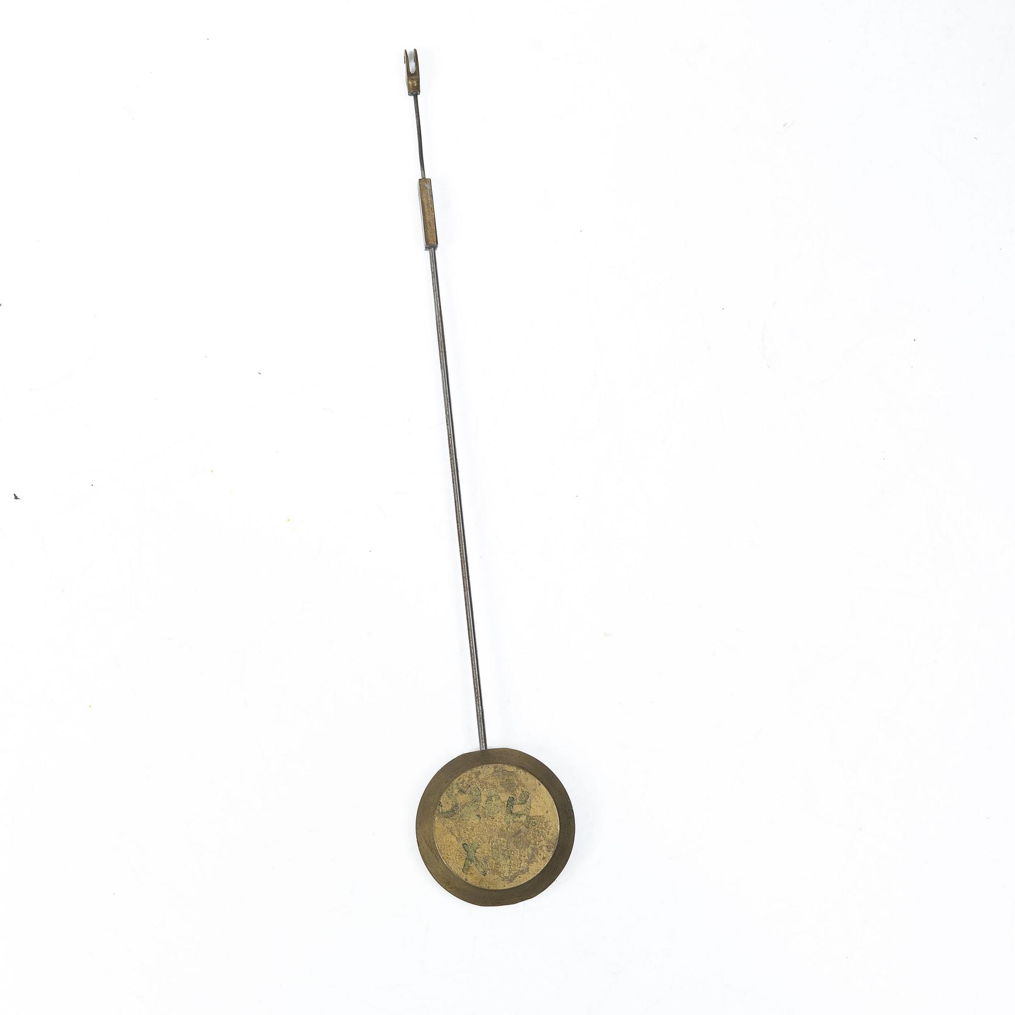 A French Charles X ormolu and patinated bronze mantel clock, ca 1820's.