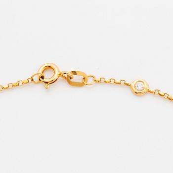Collier 18K guld med runda briljantslipade diamanter.