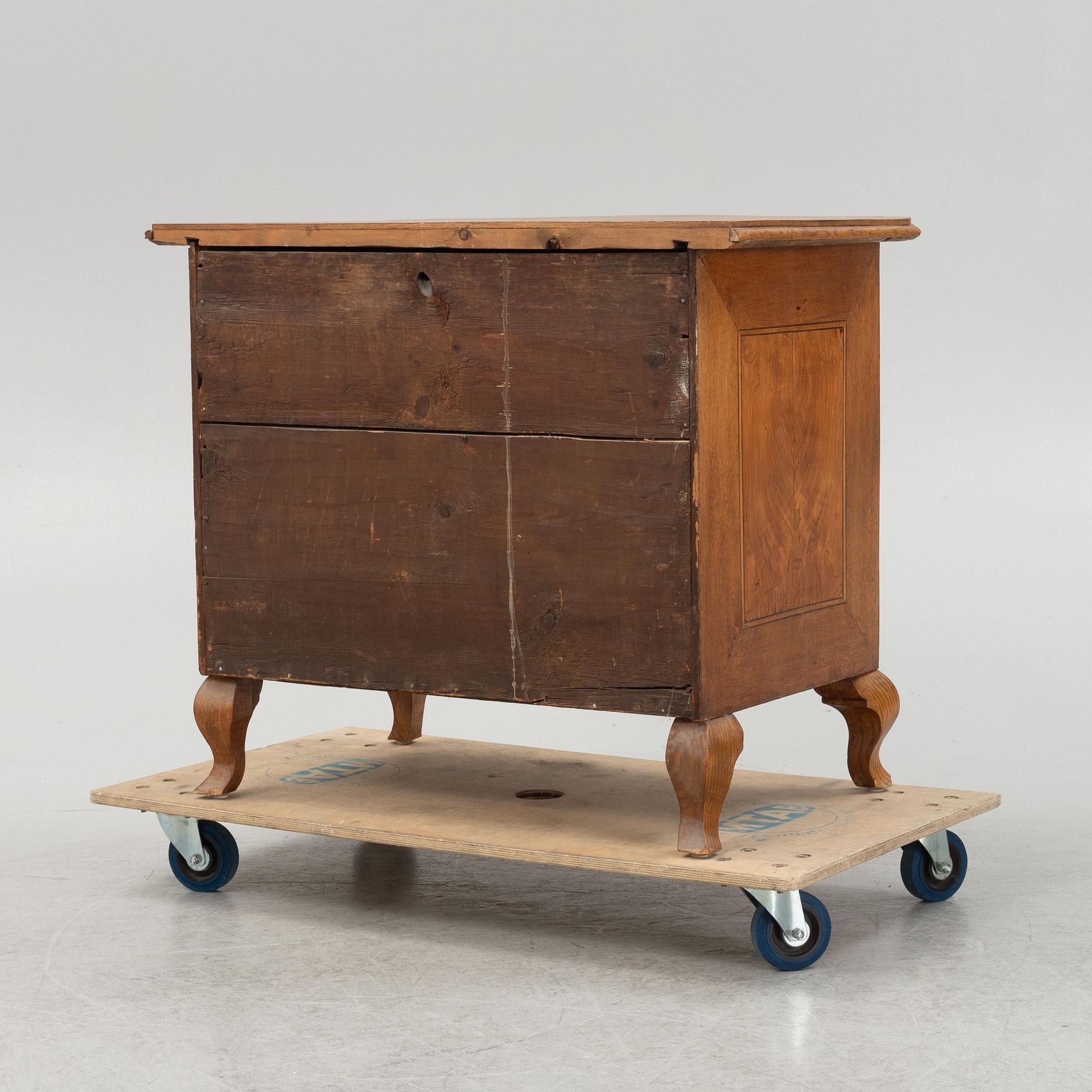 A late Baroque chest of drawers, 18th Century.