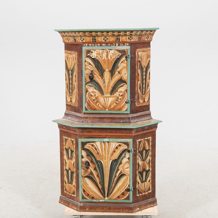 A Swedish painted corner cabinet dated 179?.