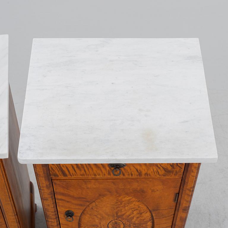 A pair of bedside tables, early 20th century.