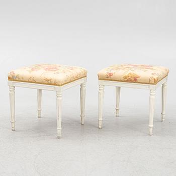 A pair of Gustavian style stools, first half of the 20th century.