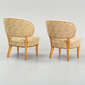 Carl Malmsten, a pair of 'Gamla Berlin' easy chairs, mid 20th Century.