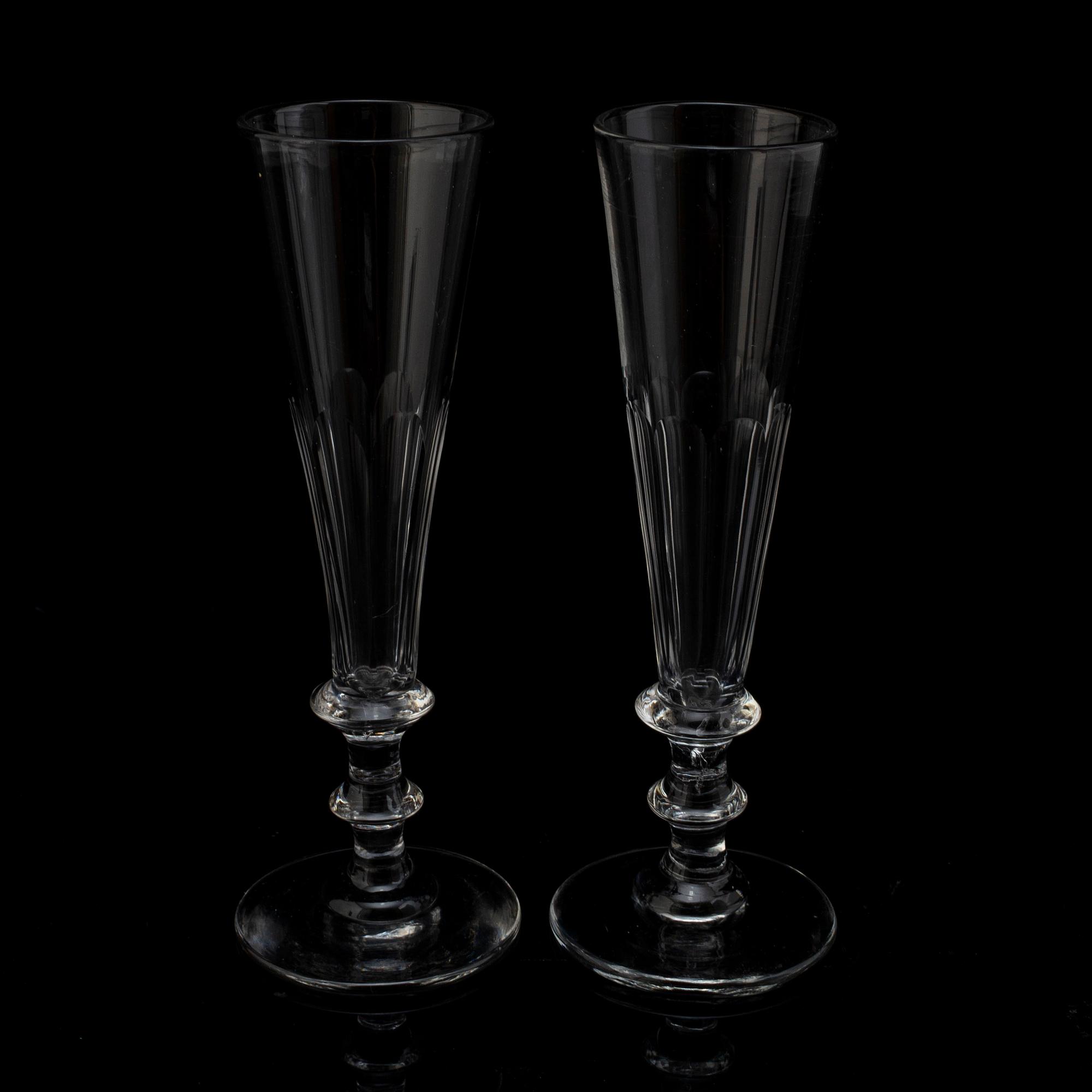 12 champagne glasses, early 20th century.