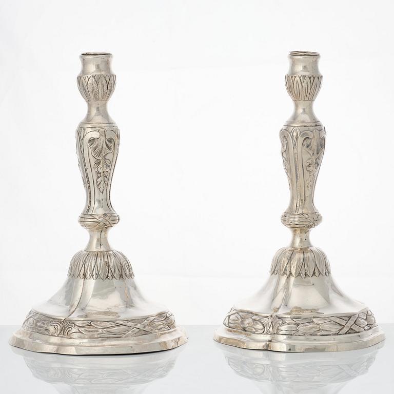 A matched pair of 18th century silver candlesticks, mark of Isak Trybom, Stockholm 1775 and.