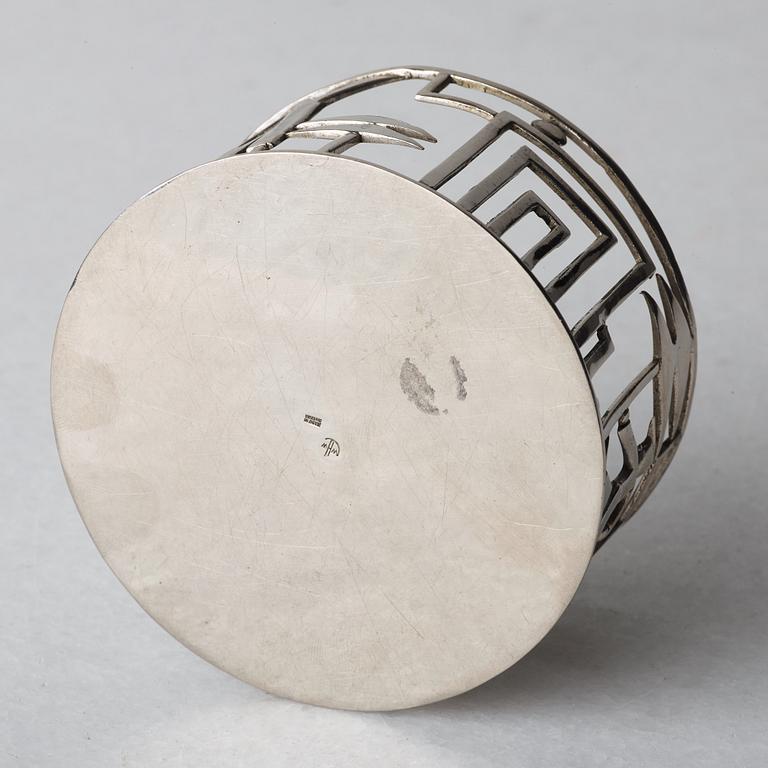 Werkstätte Hagenauer, a white metal coaster, Vienna.