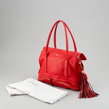 Diane von Fürstenberg a red leather handbag and wallet.