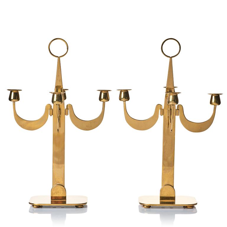 Josef Frank, a pair of brass candelabra by Svenskt Tenn, Sweden 1950's, model nr 2663.
