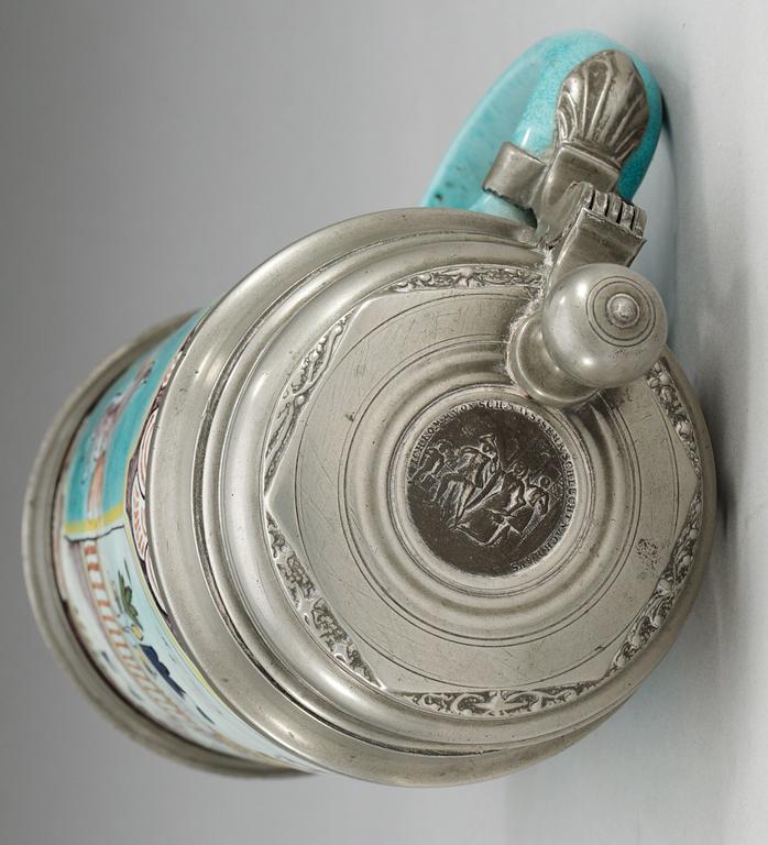 A German faience pewter-mounted tankard, 18th Century.