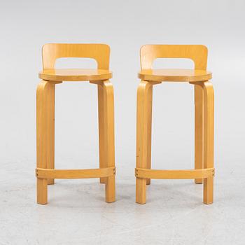 Alvar Aalto, two model 'K65' bar stools, Artek, Finland.