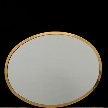 A BRASS WALL MIRROR.