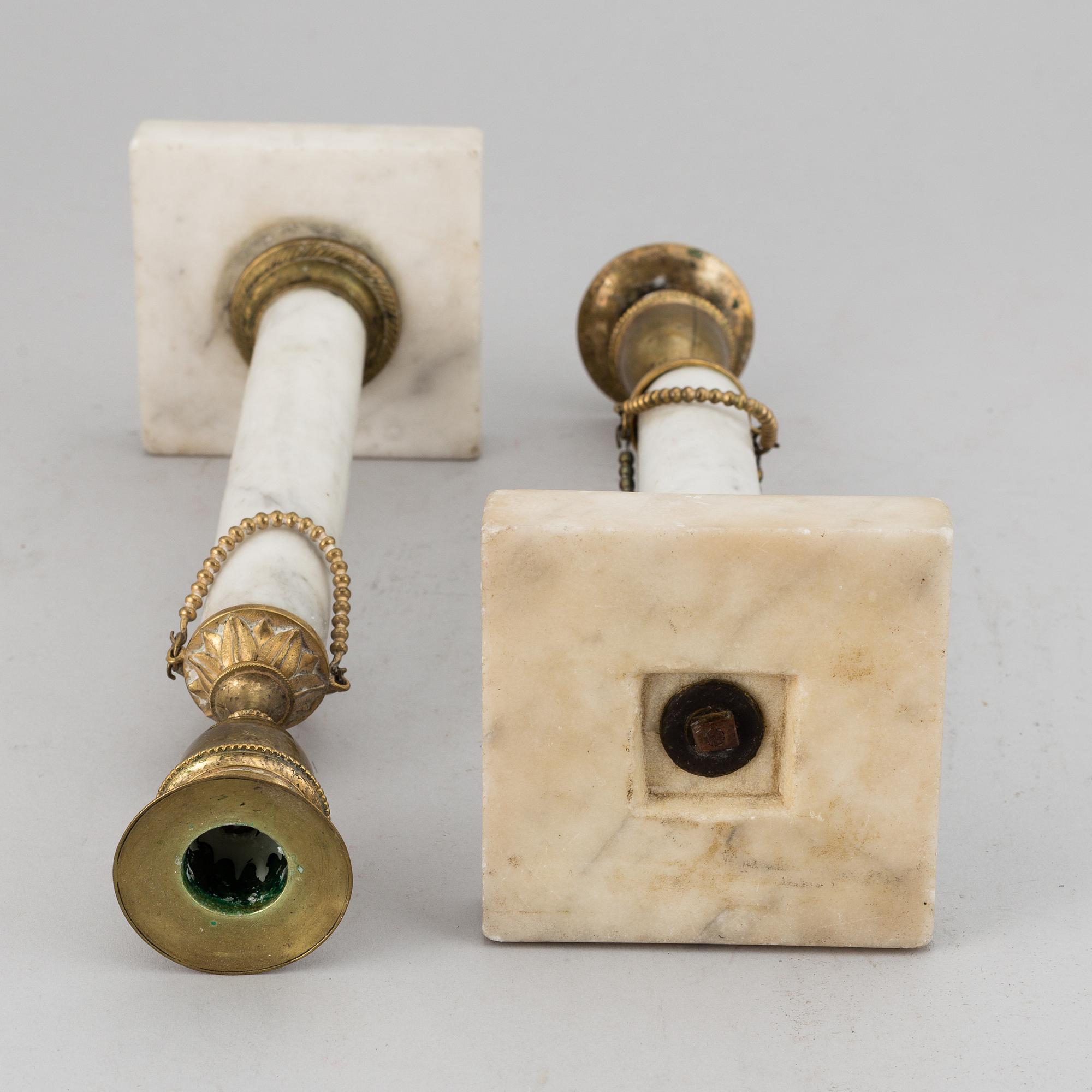 A pair of late Gustavian candle sticks.