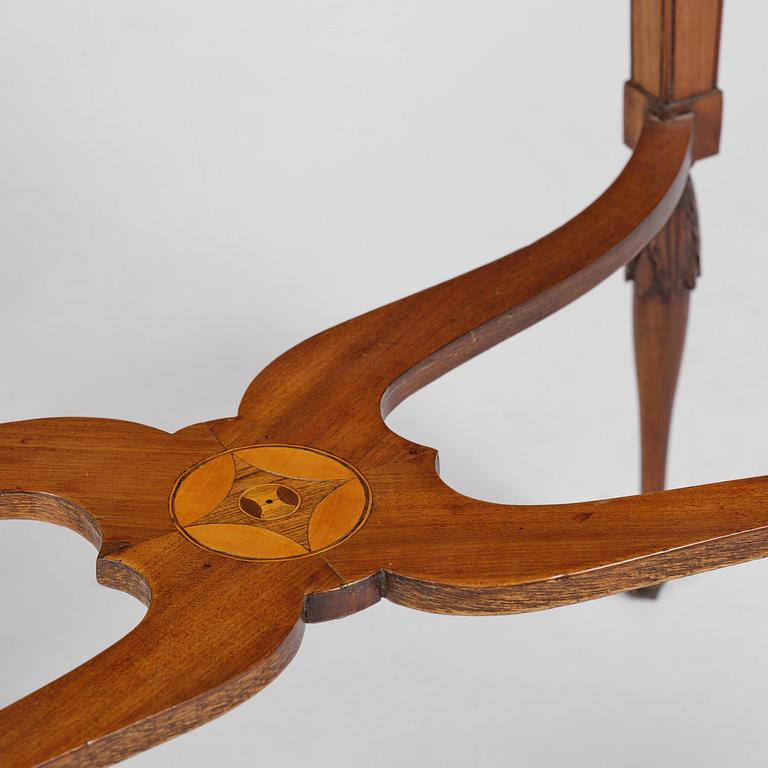 A late Mustavian mahogany table attributed to L. Qvarnberg (master in Stockholm 1801-13).