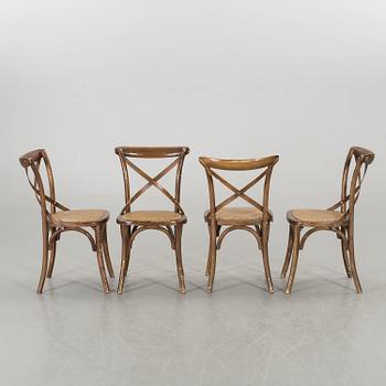 A wooden sofa, a table and four chairs, later part of the 20th century.