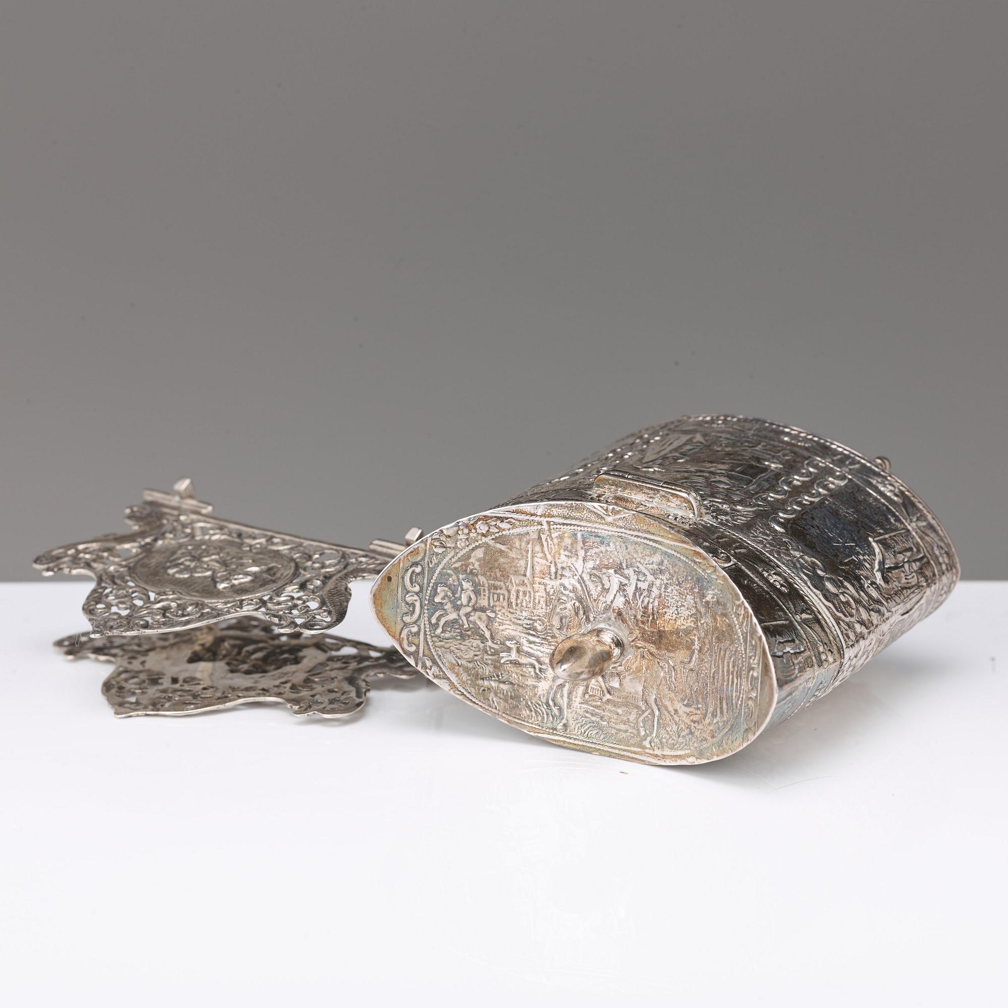 A Dutch late 19th century silver jar and napkin-holder. An ash-tray, Birmingham 1902.