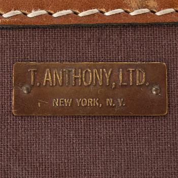 T ANTHONY Ltd, a aubergine canvas shoe suitcase from the 1970s.