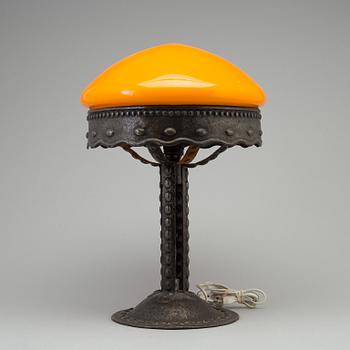 A early 20th century metal table light.