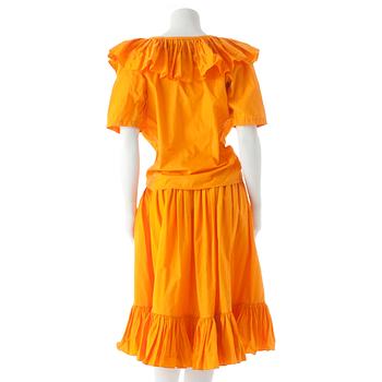 YVES SAINT LAURENT, a orange cotton top and skirt from the 80s.