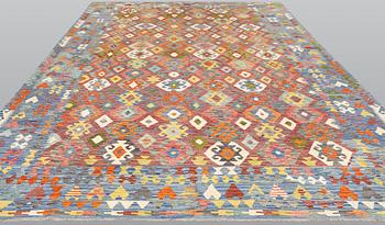 A Kilim carpet, c. 496 x 308 cm.