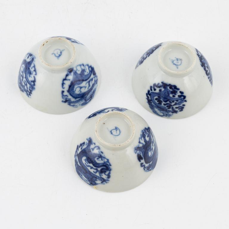 Six blue and white porcelain spoons and three cups, China, late Qing dynasty.