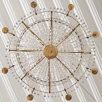 A late Gustavian nine-light gilt brass and cut glass chandelier, Stockholm, late 18th century.