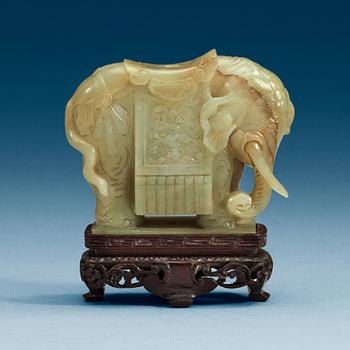 A nephrite figure of an elephant, presumably late Qing dynasty (1644-1912).