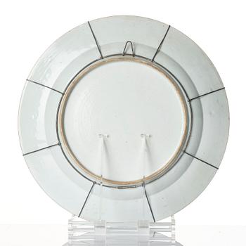 A large Chinese famille rose grisaille dish and a pair of plates, Qing dynasty, Yongzheng (1723-35).