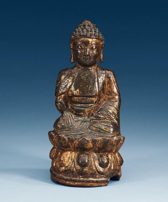A bronze Buddha with traces of gilding, Ming dynasty, 16th century.