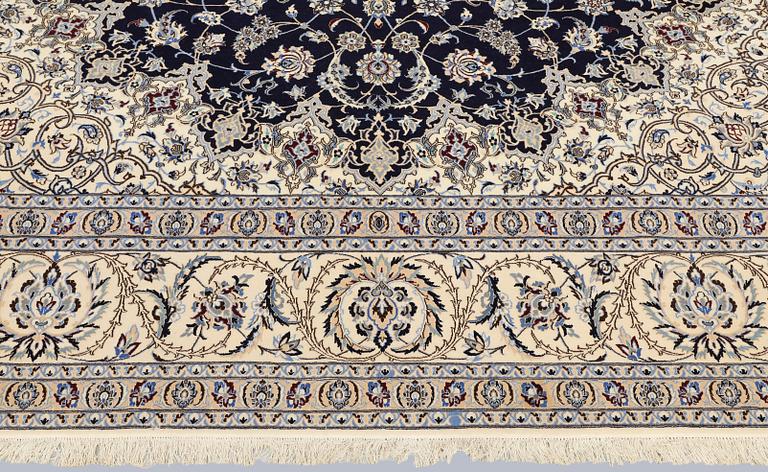 A part silk Nain carpet, so-called 4LAA, approx. 318 x 219 cm.