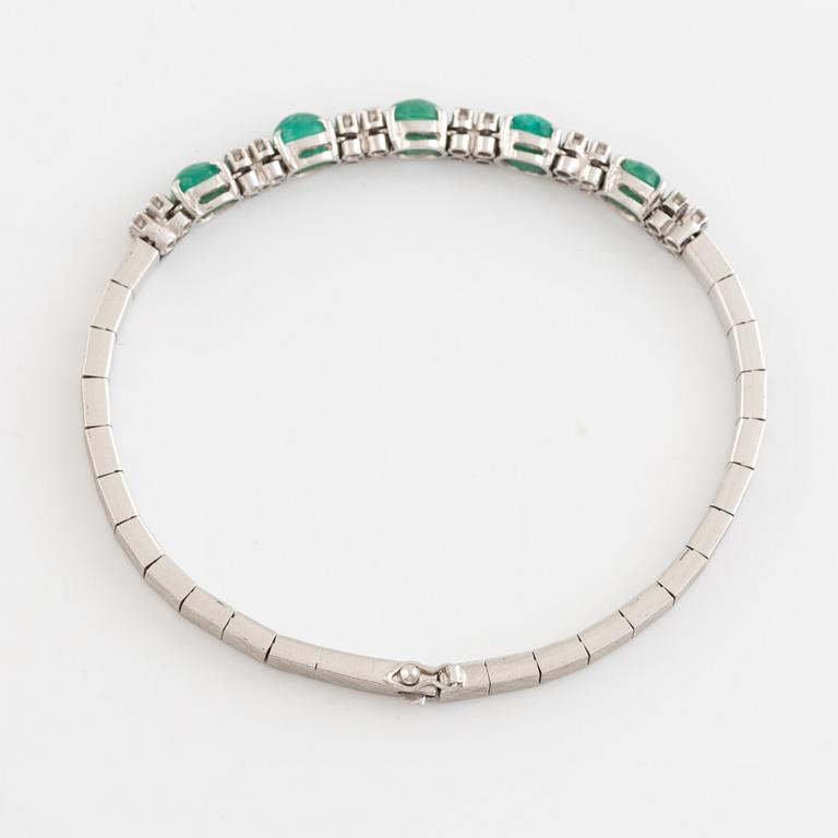 Bracelet, white gold with cabochon-cut emeralds and brilliant-cut diamonds.