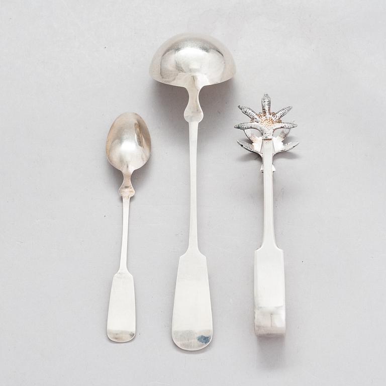 A set of six dessert spoons and a ladle, Prague, Austria-Hungary, 1872-1922. Marked EK.