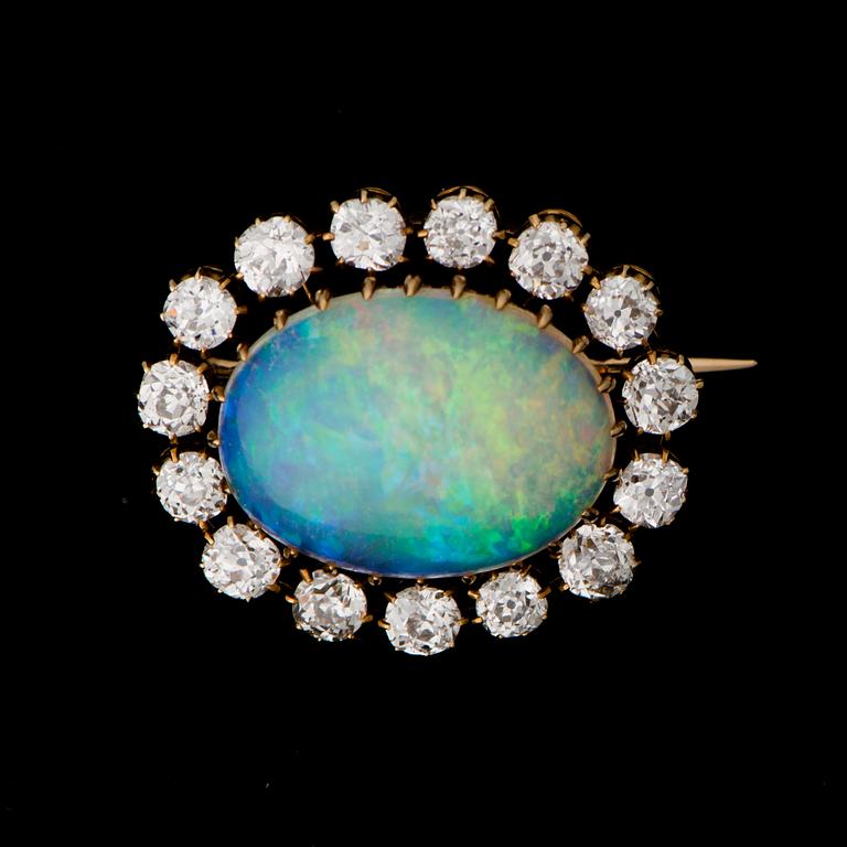 A BROOCH, opal, old cut diamonds, 18K gold.