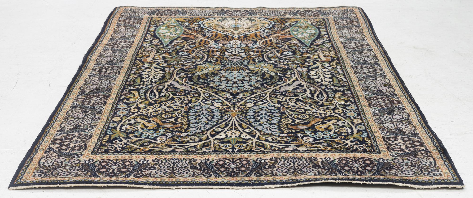 A figural Quum carpet, c. 179 x 125 cm.