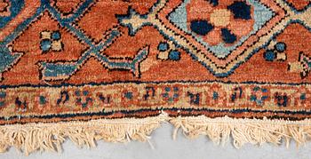 A carpet, antique Heriz, ca 334 x 271-276 cm ( ca 1-4 cm flat weave at the ends).