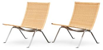 476. A pair of Poul Kjaerholm 'PK-22' steel and ratten easy chairs, Fritz Hansen, Denmark 1989.