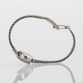 DAMARMBANDSUR, Monvis, 18K guld, 25 åttkantslipade diamanter, 1900-talets andra hälft. Vikt 20 g.