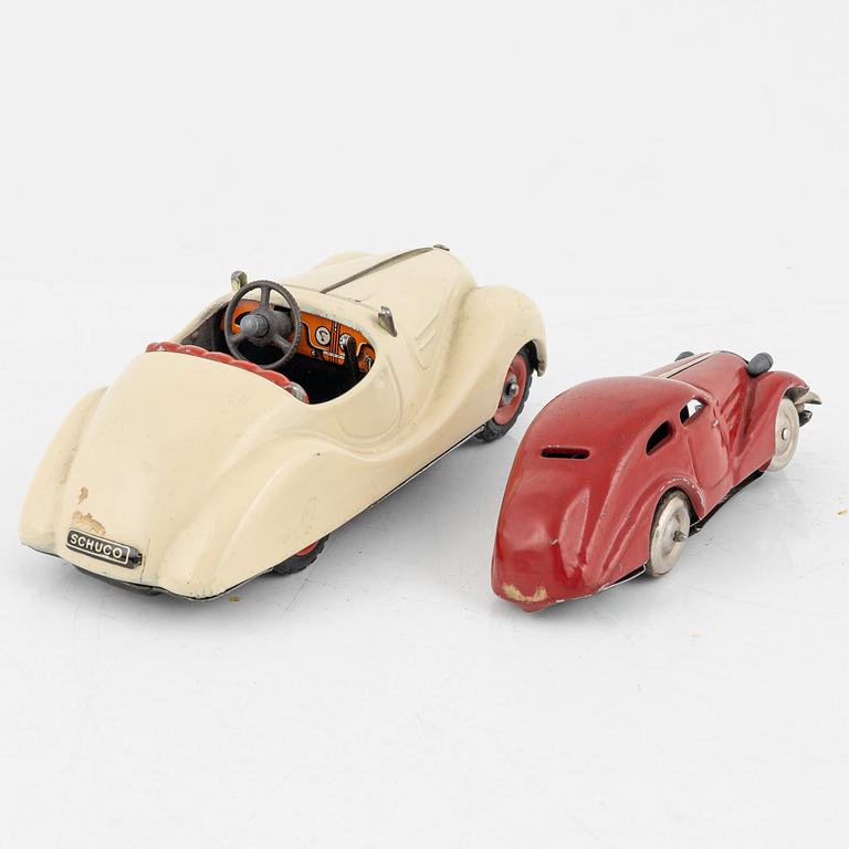 A set of five toy cars, mostly Schuco, Germany.