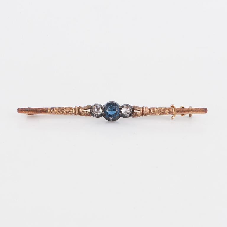 Synthetic blue stone and rose-cut diamond brooch.