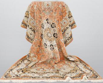A part silk Tabriz carpet, so called 50 Raj, c 301 x 200 cm.