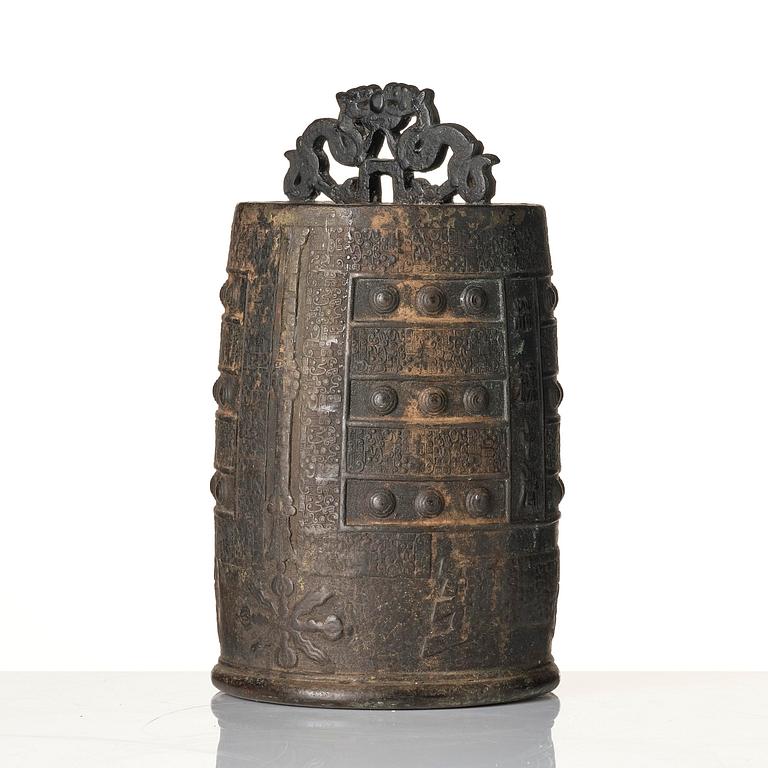 A bronze temple bell with suspension loop (Bo) and coiled and interlaced Dragons, Ming dynasty or older.