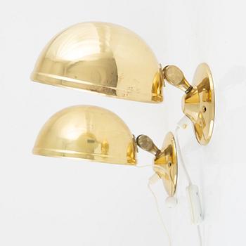 Knud Christensen Agentur, a pair of brass wall lamps, Elit, Sweden, 1960's/70's.