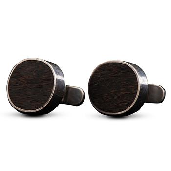 137. Bertel Gardberg, A PAIR OF CUFFLINKS, wood, silver. Helsinki 1958.