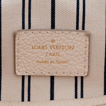 LOUIS VUITTON, a creme colored shoulder bag with embossed monogram print, "Artsy MM".