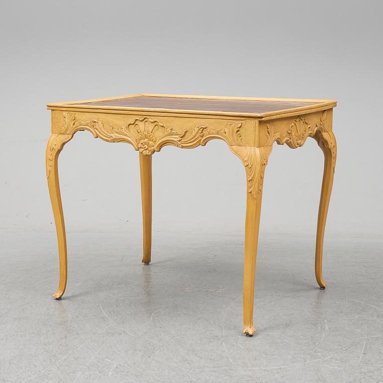 A presumably rococo style 19th century table.